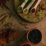 Food Aesthetics - A top-down view of various spices and beans arra #1033730
