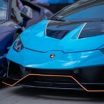 Luxury Cars - A vibrant blue Lamborghini Huracan captured in a #12499751