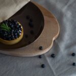 Food Aesthetics - Delicious blueberry tart on a ceramic plate with #12931396