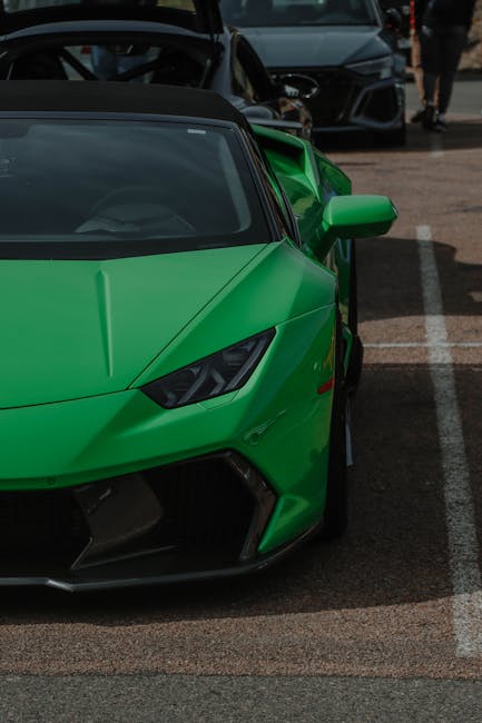 Luxury Cars - A stunning green Lamborghini Huracan parked in a #16124177