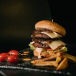 Food Aesthetics - A delicious double cheeseburger with fresh toppi #16148038