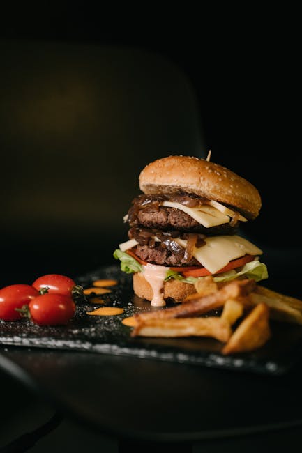 Food Aesthetics - A delicious double cheeseburger with fresh toppi #16148038