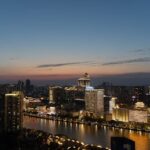 City Architecture - Stunning aerial view of Guangzhou skyline at sun #17625286