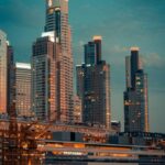 City Architecture - A breathtaking view of illuminated skyscrapers a #19559176