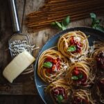 Food Aesthetics - Rustic presentation of spaghetti with tomatoes, #28767857