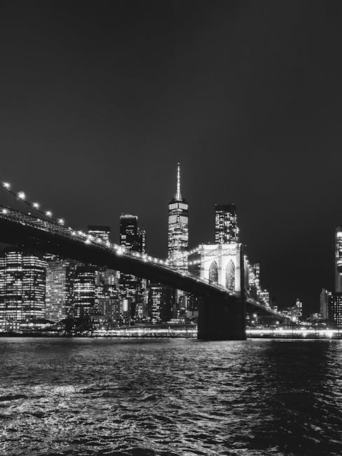 City Architecture - Black and white view of Brooklyn Bridge with Man #30532248