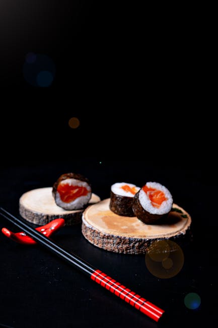 Food Aesthetics - Artistic sushi presentation with salmon rolls on #31286783