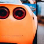 Luxury Cars - A vibrant orange sports car showcasing its sleek #33285084