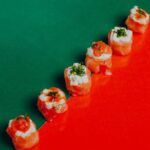 Food Aesthetics - A row of sushi rolls displayed artistically on a #33354383