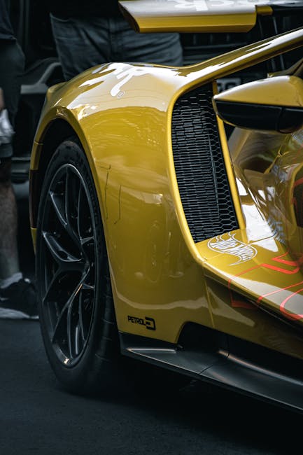 Luxury Cars - Detailed view of a yellow sports car featuring s #34214697
