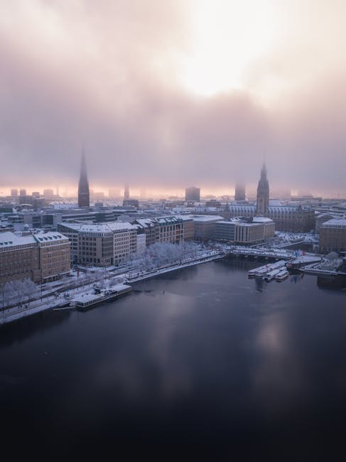 City Architecture - A breathtaking aerial view of Hamburg's snowy sk #35554458