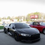 Luxury Cars - A stylish black sports car parked outdoors with #37039272