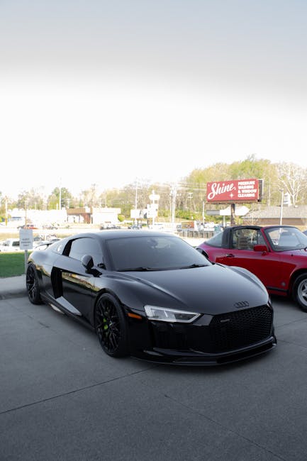 Luxury Cars - A stylish black sports car parked outdoors with #37039272