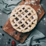 Food Aesthetics - Delicious lattice-top pie with blueberries on a #5107179