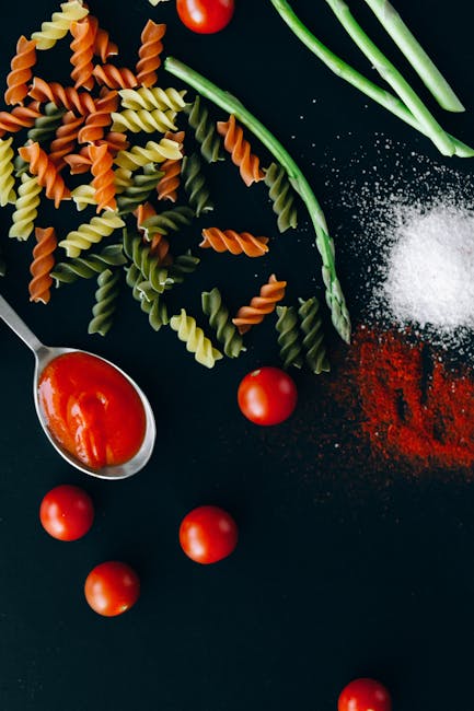 Food Aesthetics - Vibrant flatlay of uncooked fusilli, asparagus, #5794882