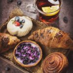 Food Aesthetics - A selection of pastries with blueberries, cream, #7332909