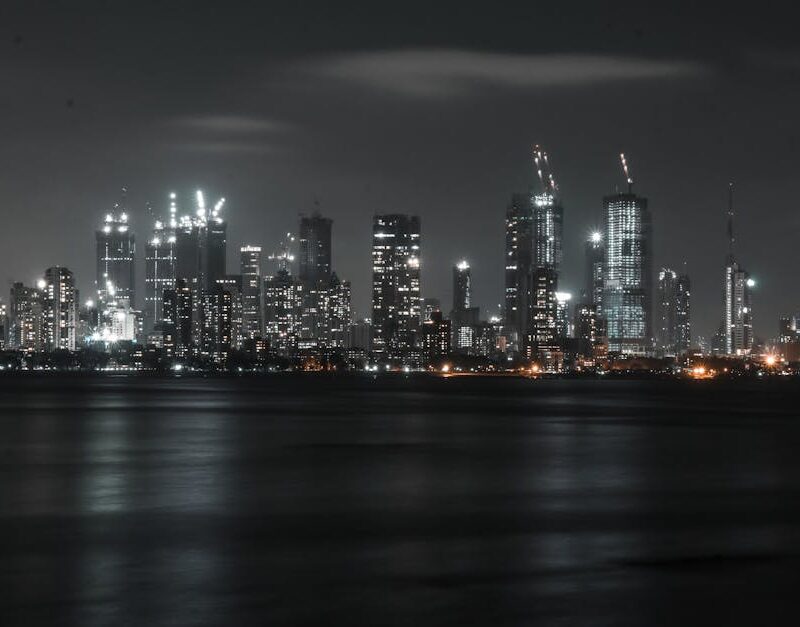 City Architecture - An impressive city skyline illuminated at night, #8182150