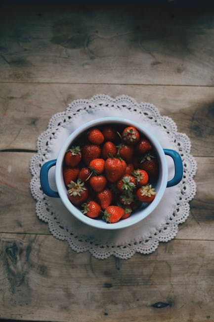 Food Aesthetics - Top view of fresh strawberries in a ceramic bowl #8990139